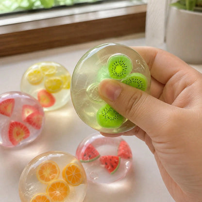 Fruit coconut squeeze ball held in hand