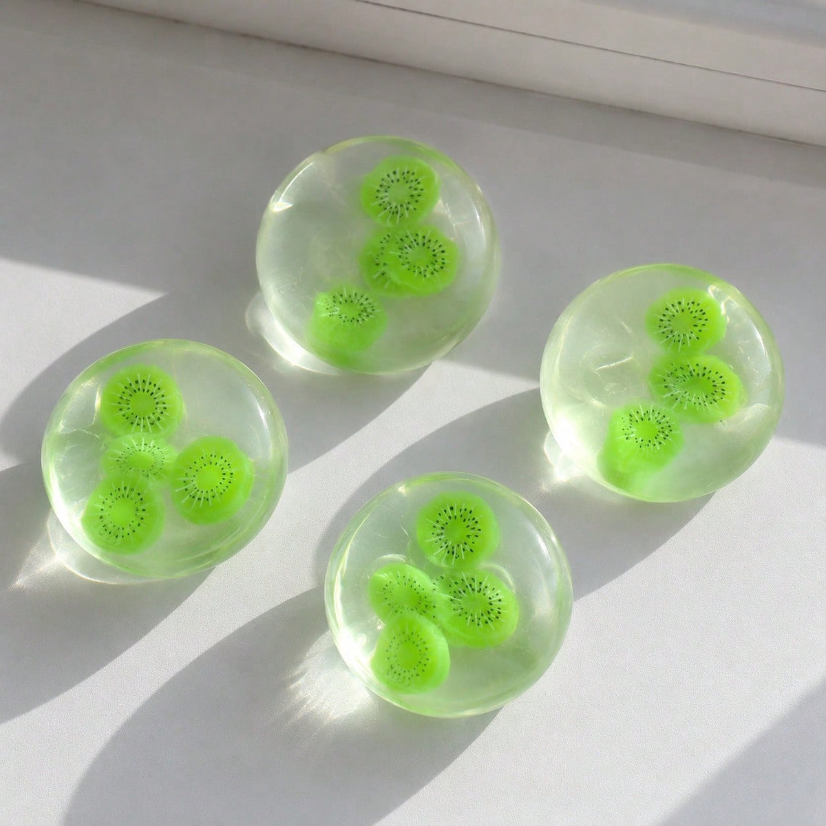 Fruit squeeze ball being pressed