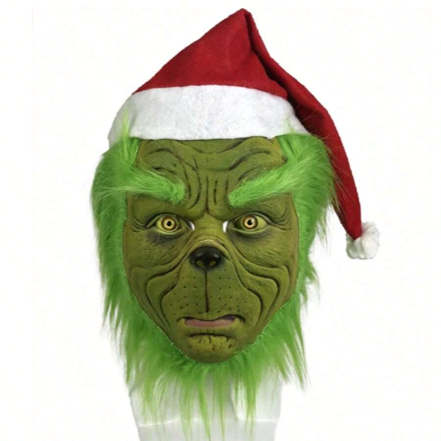 Green furry Christmas character mask with Santa hat