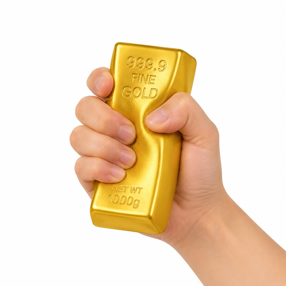 Gold bar squishy squeezed in hand